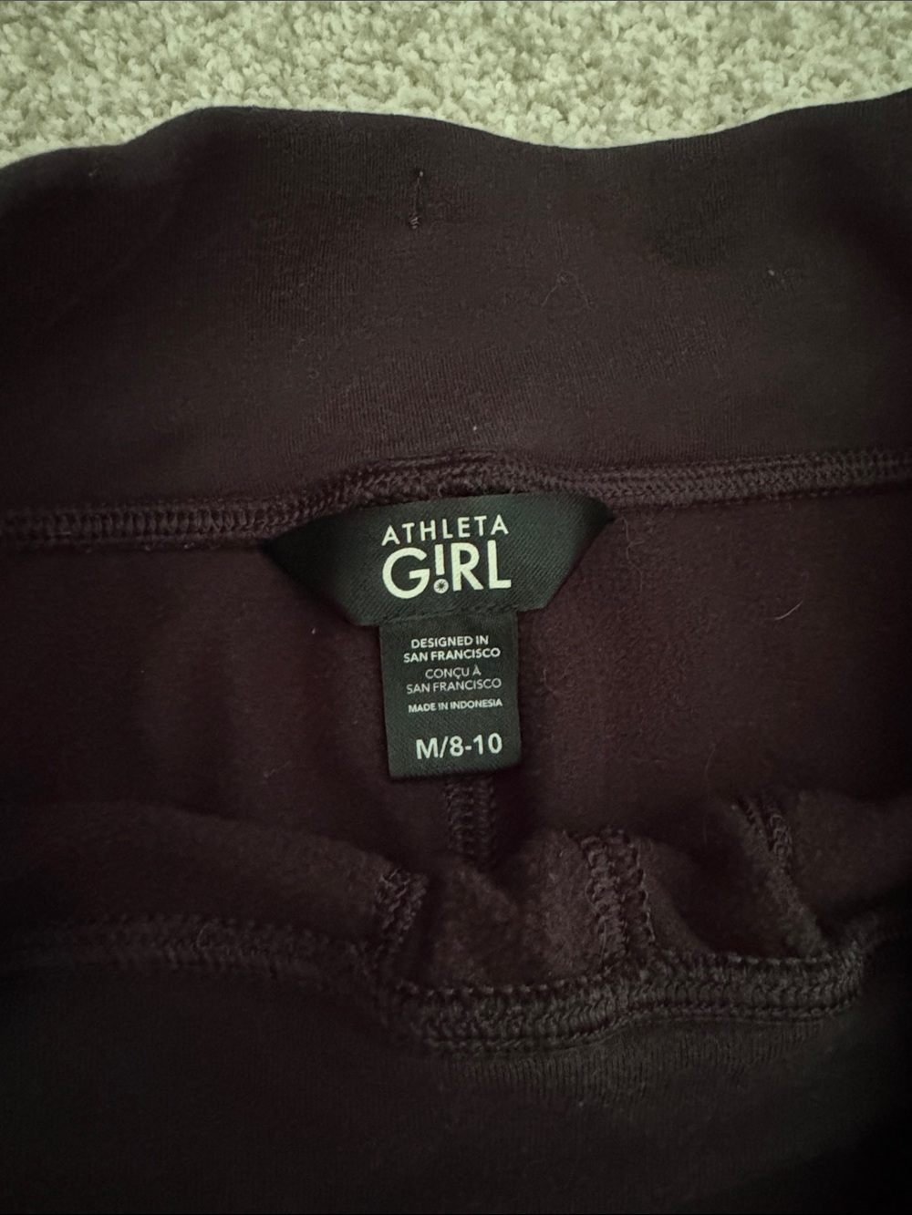 Athleta Girl Leggings in black- flare leg